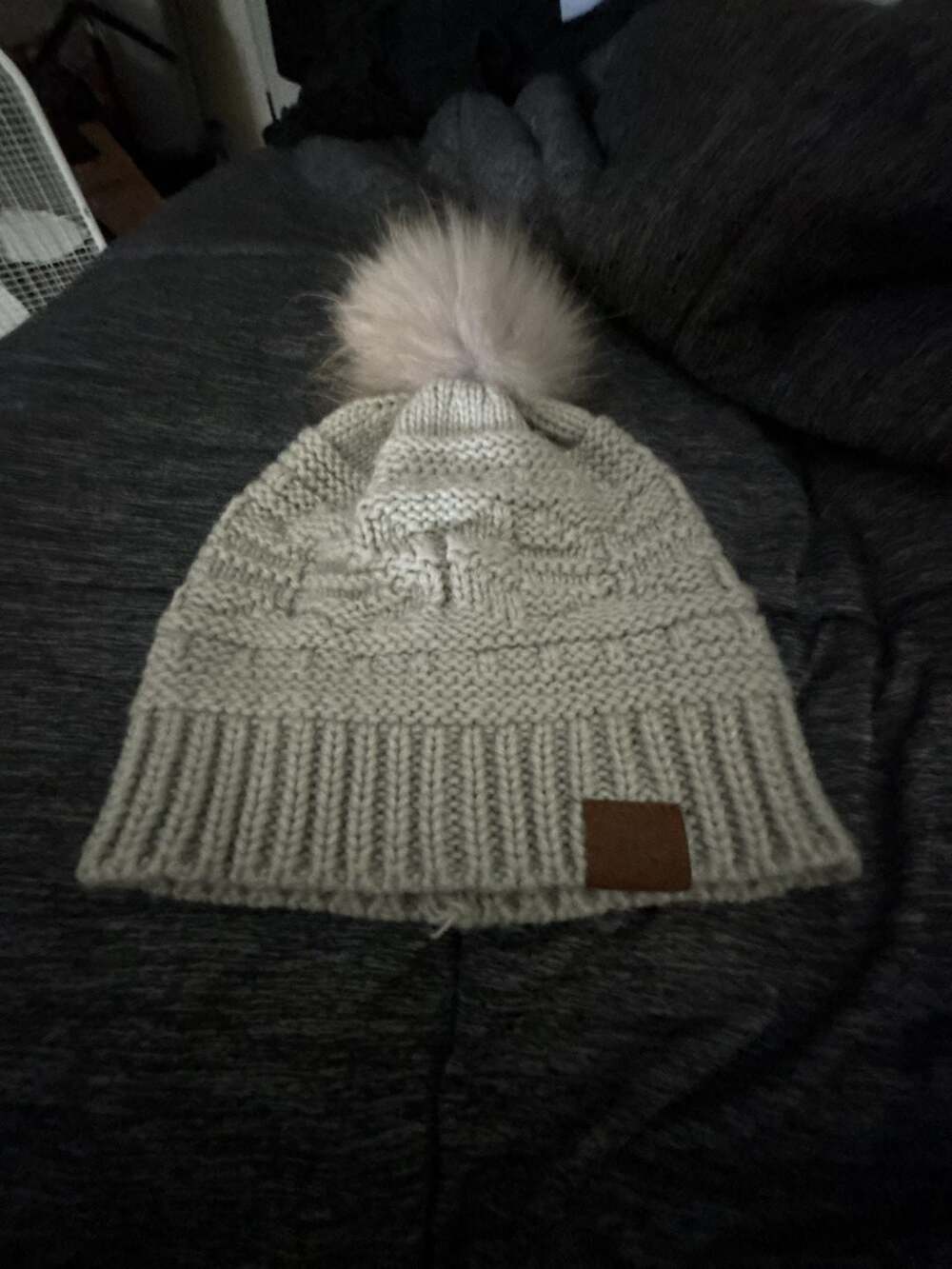 Cloie Winter Gray Knit Beanie Hat with Faux Fur Pom Pom and Leather Patch